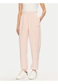 Guess Spodnie dresowe V4BB13 K7UW2 Różowy Regular Fit. Kolor: różowy. Materiał: wiskoza