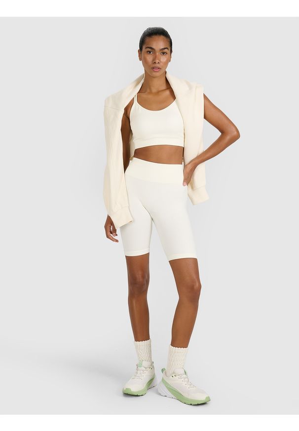 4f - 4F Legginsy kolarki treningowe bezszwowe damskie - beżowe M/L. Stan: podwyższony. Kolor: beżowy. Materiał: materiał, syntetyk, dzianina, włókno, elastan. Długość: krótkie. Wzór: gładki. Sport: fitness