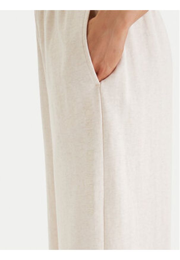 TOMMY HILFIGER - Tommy Hilfiger Spodnie dresowe UW0UW06180 Beżowy Wide Leg. Kolor: beżowy. Materiał: bawełna