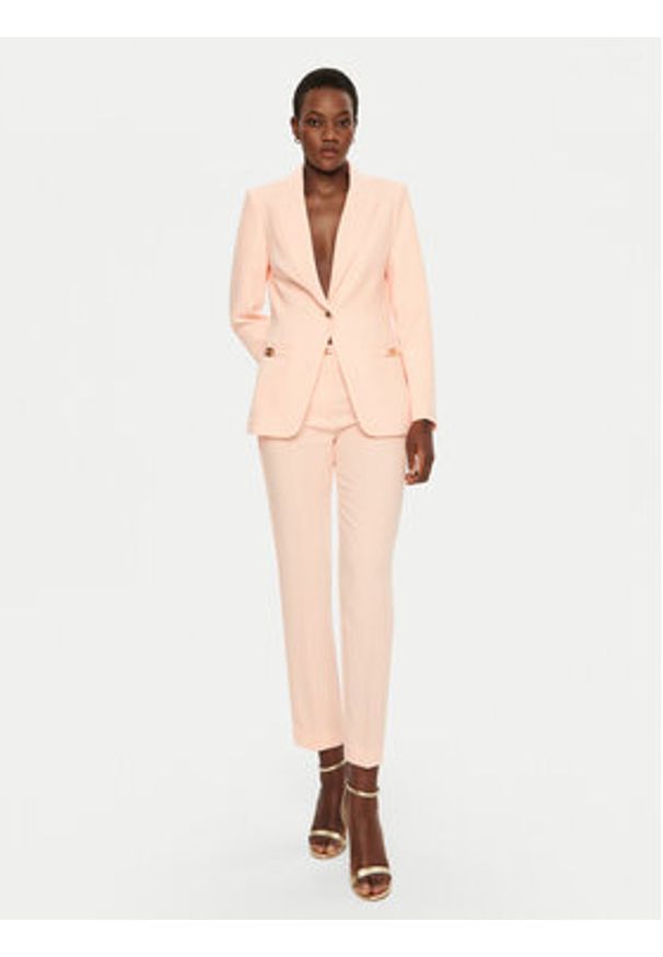 Marciano Guess Spodnie materiałowe 5RGB03 7115A Koralowy Slim Fit. Kolor: pomarańczowy. Materiał: syntetyk