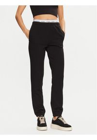 Guess Spodnie dresowe O5RB01 KCO31 Czarny Regular Fit. Kolor: czarny. Materiał: bawełna #1