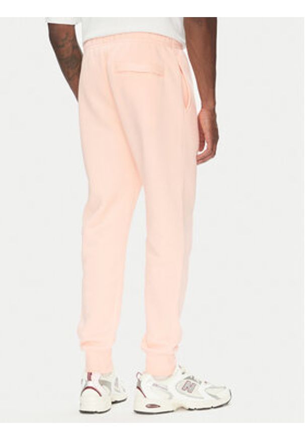 Nike Spodnie dresowe BV2671 Pomarańczowy Regular Fit. Kolor: pomarańczowy. Materiał: bawełna