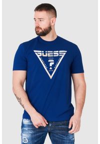 Guess - GUESS Granatowy t-shirt męski z logo w moro. Kolor: niebieski. Wzór: moro #1