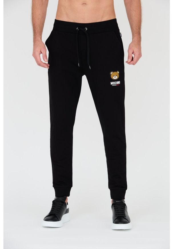 MOSCHINO Czarne męskie spodnie dresowe, Rozmiar L. Kolor: czarny. Materiał: dresówka