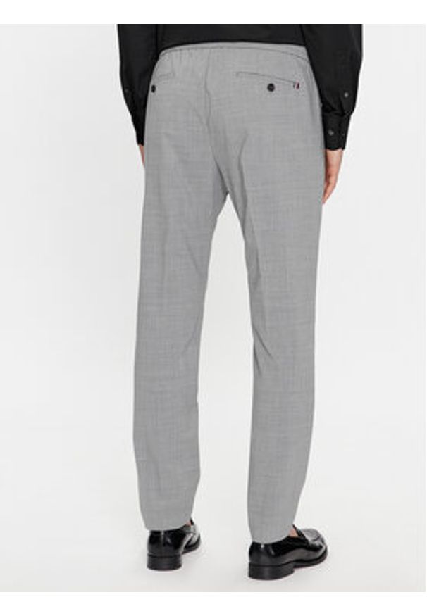 TOMMY HILFIGER - Tommy Hilfiger Spodnie materiałowe Dc Chelsea Po Travel Wool MW0MW33930 Szary Regular Fit. Kolor: szary. Materiał: syntetyk