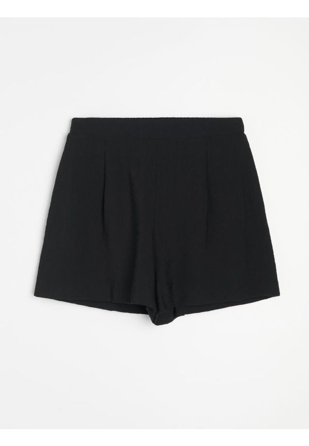 Sinsay - Luźne szorty z wiskozą - czarny. Kolor: czarny. Materiał: wiskoza
