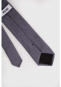 MOSCHINO - Moschino krawat kolor szary. Kolor: szary. Materiał: materiał. Wzór: gładki #2