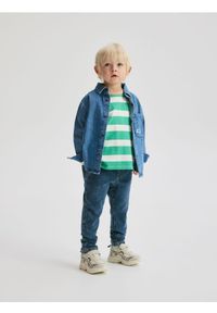 Reserved - Bawełniane jegginsy - niebieski. Kolor: niebieski. Materiał: bawełna #1