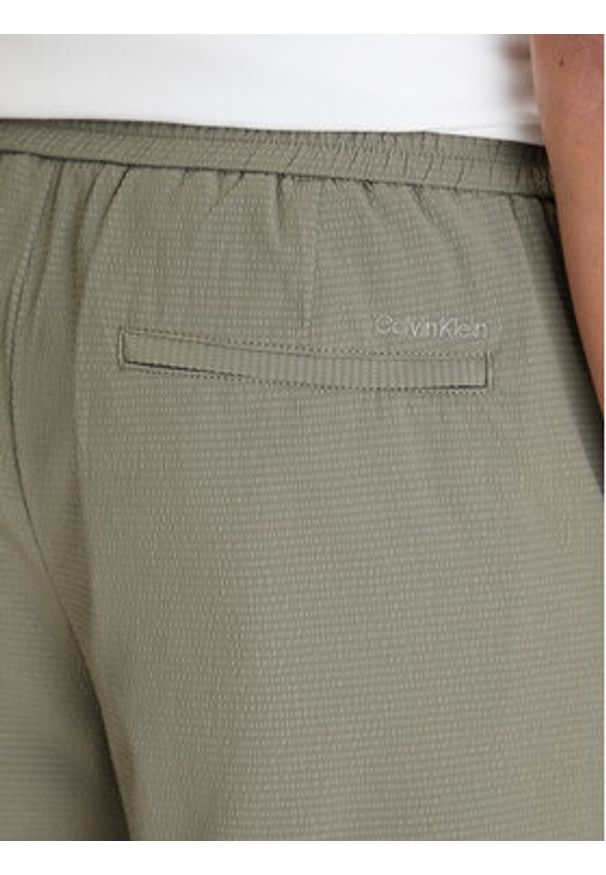 Calvin Klein Szorty materiałowe LV04LF610G Khaki Straight Fit. Kolor: brązowy. Materiał: syntetyk