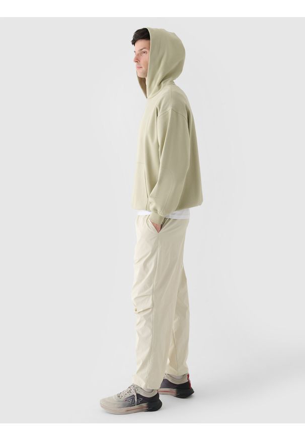 4f - 4F Bluza dresowa nierozpinana z kapturem męska - oliwkowa/khaki 3XL. Okazja: na co dzień. Typ kołnierza: kaptur. Kolor: oliwkowy, brązowy, wielokolorowy. Materiał: dresówka. Wzór: ze splotem, gładki. Styl: casual, sportowy