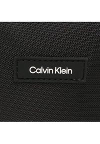 Calvin Klein Saszetka Ck Must T Reporter Xs K50K510570 Czarny. Kolor: czarny. Materiał: materiał #3