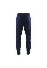 Spodnie treningowe męskie Craft Evolve. Kolor: niebieski. Materiał: dresówka. Sport: fitness