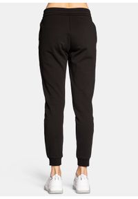 Spodnie dresowe damskie czarne Armani Exchange 8NYPCX YJ68Z 1200. Kolor: czarny. Materiał: dresówka