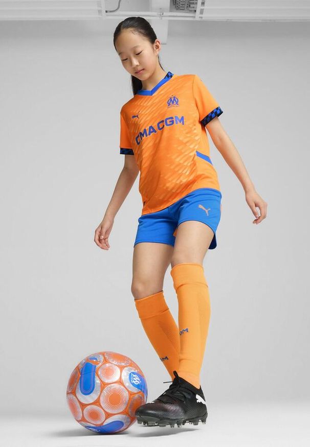 Puma - Młodzieżowe szorty Olympique Marsylia 24/25 PUMA Racing Blue Fluro Orange Pes. Kolor: pomarańczowy, wielokolorowy, niebieski, żółty. Sport: piłka nożna