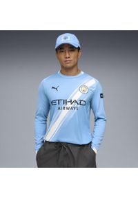 Puma - Męska koszulka domowa z długim rękawem Manchester City 25/26 PUMA. Kolor: niebieski, wielokolorowy, biały. Długość rękawa: długi rękaw. Długość: długie. Wzór: aplikacja, paski. Sport: piłka nożna