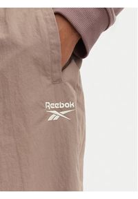 Reebok Spodnie dresowe Kalina RK25694CCW - LIGHT COCOA/LINEN Brązowy Relaxed Fit. Kolor: brązowy. Materiał: syntetyk #4