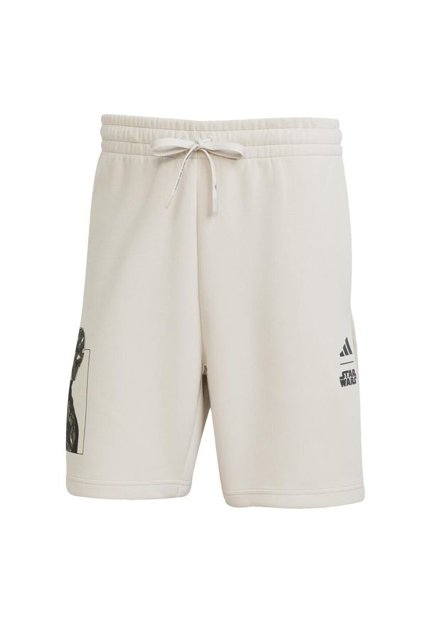 Szorty Adidas Star Wars The Mandalorian. Kolor: beżowy. Materiał: materiał. Wzór: motyw z bajki. Sport: fitness