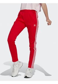 Adidas - Spodnie dresowe adidas. Kolor: czerwony. Materiał: dresówka #1