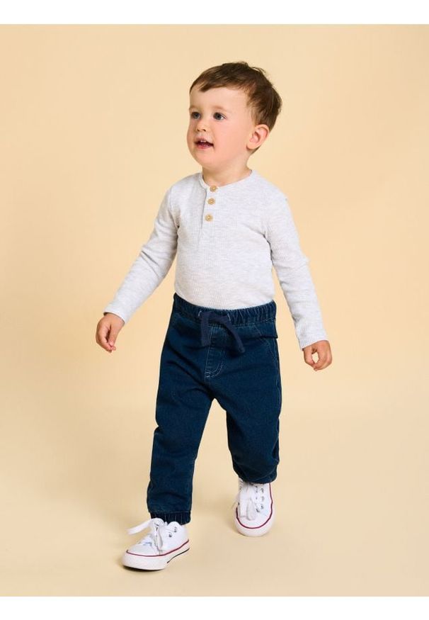 Sinsay - Spodnie jeansowe - niebieski. Kolor: niebieski. Materiał: jeans