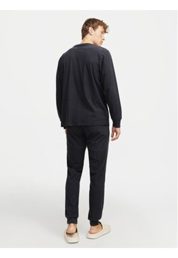 Jack & Jones - Jack&Jones Piżama Solid 12268536 Czarny Loose Fit. Kolor: czarny. Materiał: syntetyk