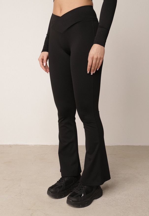 Born2be - Czarne Legginsy o Fasonie Dzwonów z Wysokim Stanem Jaenlenne. Okazja: do pracy, na co dzień, na spotkanie biznesowe. Stan: podwyższony. Kolor: czarny. Styl: elegancki, biznesowy, casual