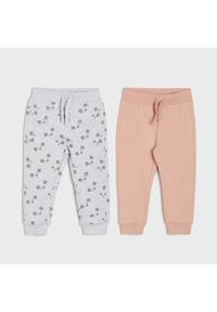 Sinsay - Spodnie dresowe 2 pack - Różowy. Kolor: różowy. Materiał: dresówka #1