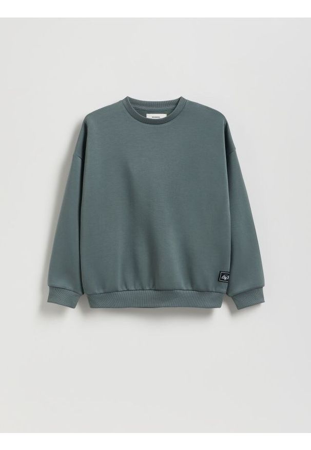 Reserved - Bluza oversize z nadrukiem - zielony. Kolor: zielony. Materiał: dzianina. Wzór: nadruk