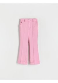 Reserved - Eleganckie spodnie flare - różowy. Kolor: różowy. Materiał: tkanina, włókno, wiskoza. Styl: elegancki