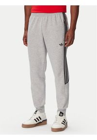 Adidas - adidas Spodnie dresowe Spacer Teamgeist 26 Cutline Cuffed KR7072 Szary Regular Fit. Kolor: szary. Materiał: bawełna. Sport: turystyka piesza #1