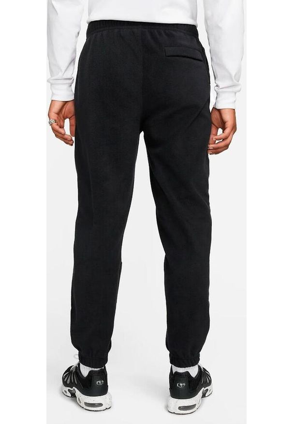 Spodnie sportowe męskie Nike Club Fleece Pant. Kolor: czarny. Materiał: poliester. Sport: piłka nożna