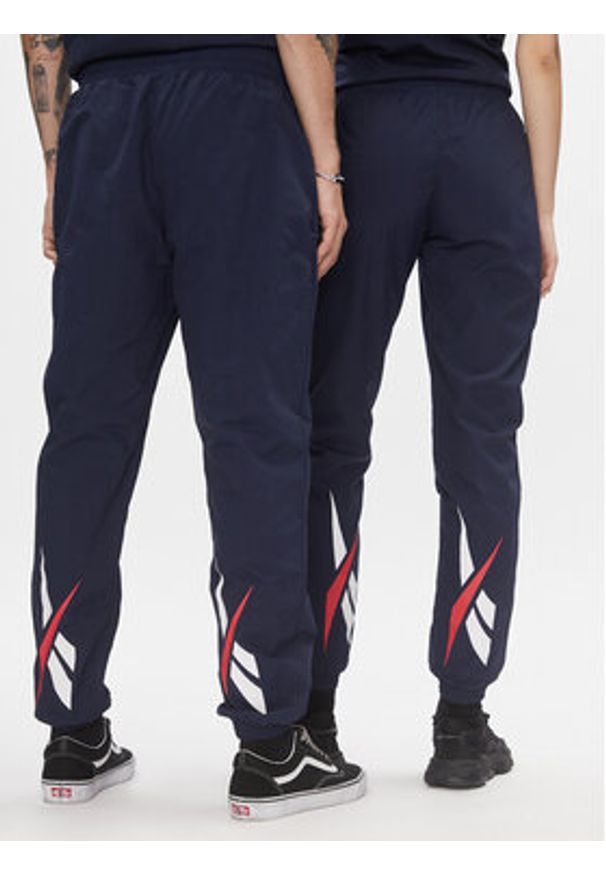 Reebok Spodnie dresowe Classics Vector Tracksuit Bottoms H54439 Niebieski Slim Fit. Kolor: niebieski. Materiał: syntetyk