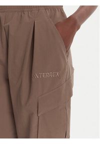 Adidas - adidas Spodnie outdoor Terrex Xploric JM9857 Brązowy Loose Fit. Kolor: brązowy. Materiał: syntetyk. Sport: outdoor #3