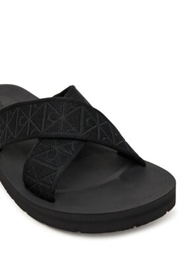Calvin Klein Klapki Ess Diecut Xcross Wb Aop HM0HM02093 Czarny. Kolor: czarny. Materiał: materiał