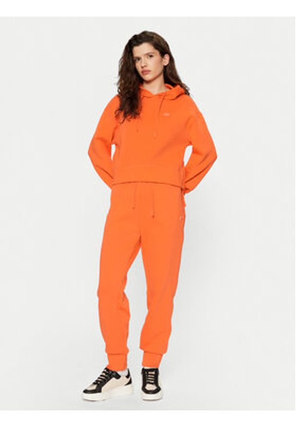 Lacoste Spodnie dresowe XF0343 Pomarańczowy Regular Fit. Kolor: pomarańczowy. Materiał: bawełna