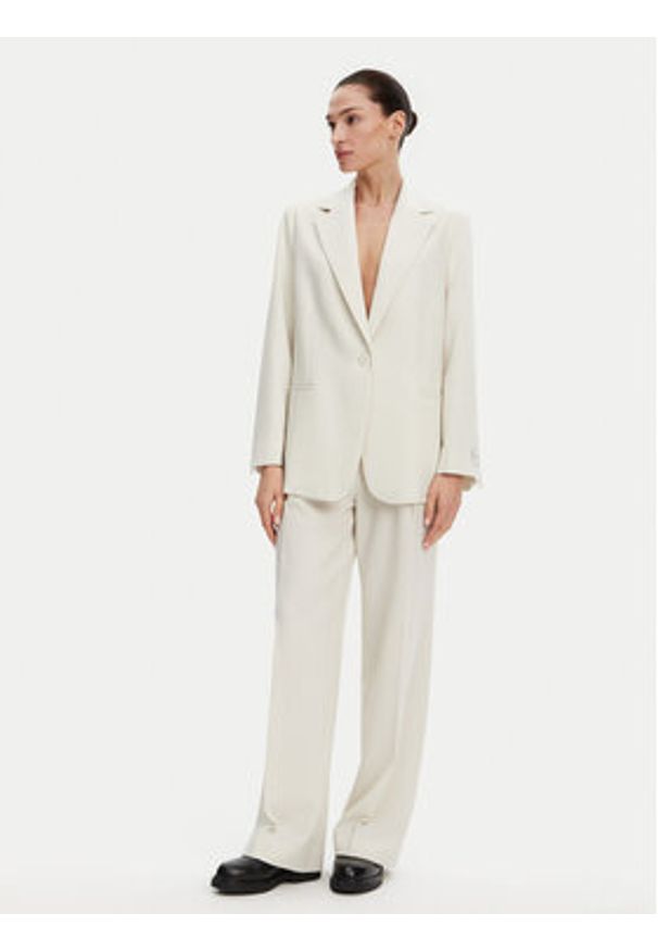 Calvin Klein Spodnie palazzo K20K208217 Beżowy Wide Leg. Kolor: beżowy. Materiał: syntetyk