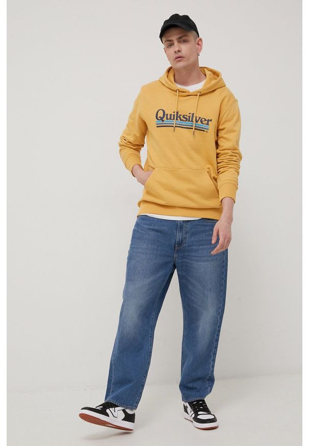 Quiksilver bluza męska kolor żółty z kapturem z nadrukiem. Okazja: na co dzień. Typ kołnierza: kaptur. Kolor: żółty. Materiał: bawełna, dzianina. Wzór: nadruk. Styl: casual