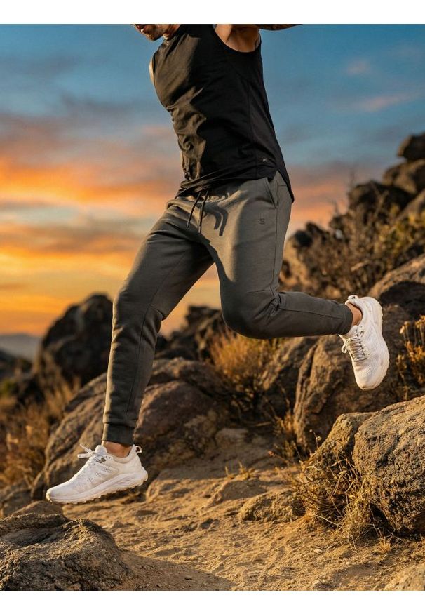 Sinsay - Spodnie tapered fit SNSY PERFORMANCE - zielony. Kolor: zielony