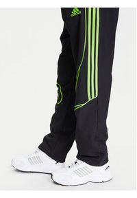 Adidas - adidas Spodnie dresowe Teamgeist adicolor JW5869 Czarny Loose Fit. Kolor: czarny. Materiał: syntetyk #5