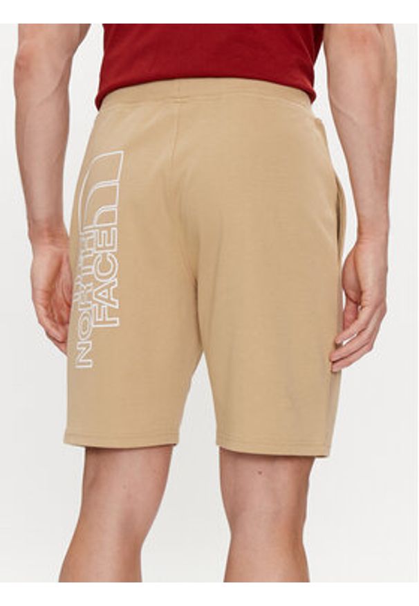 The North Face Szorty sportowe Graphic NF0A3S4F Beżowy Regular Fit. Kolor: beżowy. Materiał: bawełna. Styl: sportowy