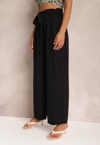 Renee - Czarne Spodnie Szerokie Phiorephis. Kolor: czarny. Materiał: wiskoza, tkanina, materiał. Długość: długie. Wzór: gładki, kwiaty