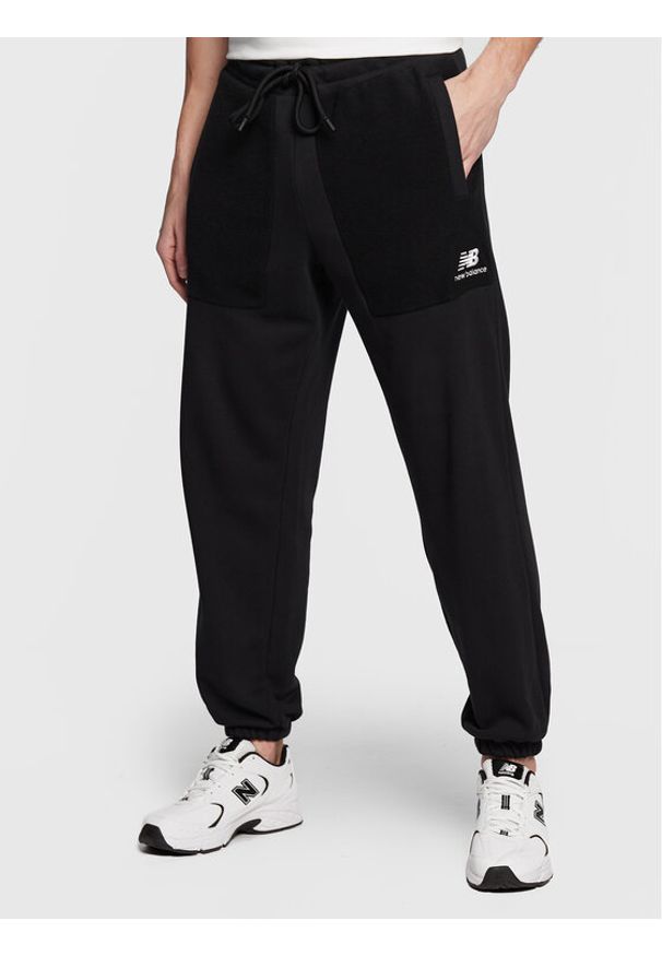 Spodnie dresowe New Balance. Kolor: czarny. Materiał: dresówka