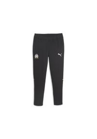 Spodnie Mężczyzna Puma Olympique Marseille Casuals czarny. Kolor: czarny, wielokolorowy, pomarańczowy. Materiał: dresówka. Sport: piłka nożna