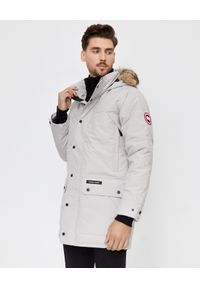 CANADA GOOSE - Beżowa parka Emory. Okazja: na spacer. Kolor: beżowy. Materiał: futro, puch. Wzór: aplikacja. Sezon: zima. Styl: klasyczny #1