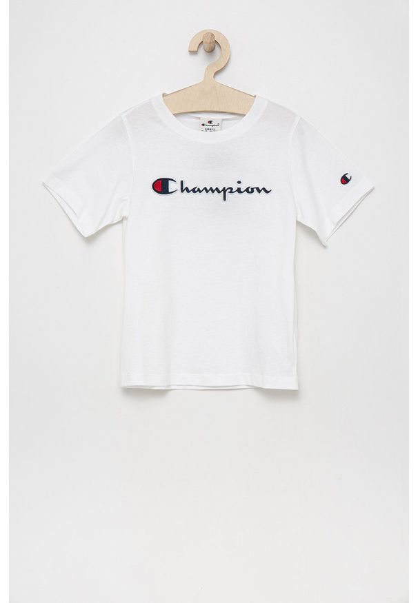 Champion t-shirt bawełniany dziecięcy kolor biały. Kolor: biały. Materiał: bawełna. Długość rękawa: krótki rękaw. Długość: krótkie. Wzór: aplikacja