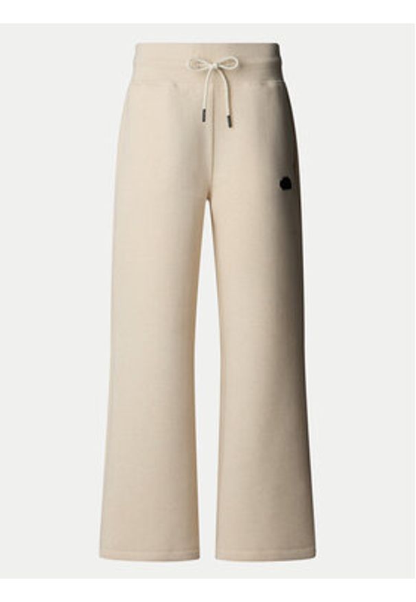 The North Face Spodnie dresowe NF0A8C25 Beżowy Wide Leg. Kolor: beżowy. Materiał: bawełna