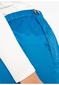 Spodnie przeciwdeszczowe, długie bonprix lodowy niebieski z nadrukiem. Kolor: niebieski. Materiał: materiał, poliamid. Długość: długie. Wzór: nadruk #2
