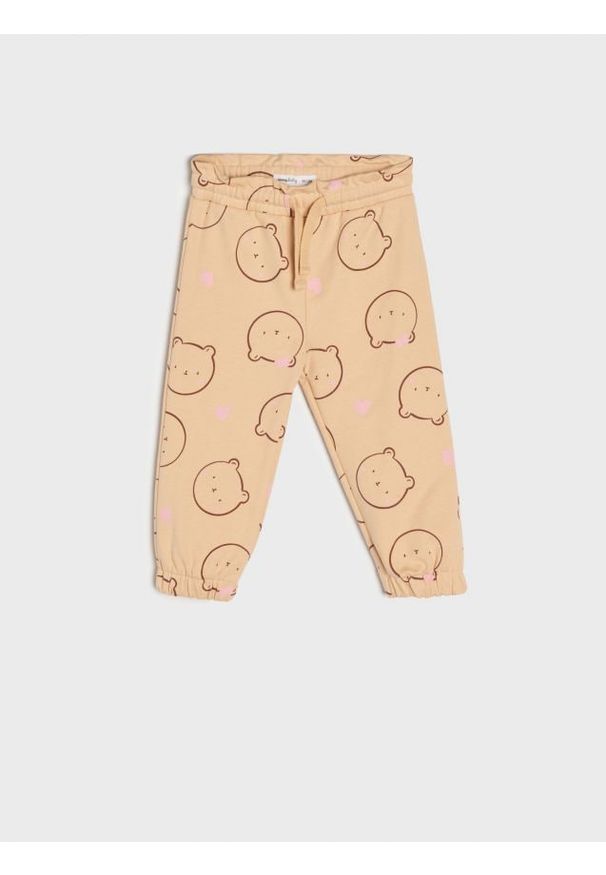 Sinsay - Spodnie dresowe jogger - beżowy. Kolor: beżowy. Materiał: dresówka