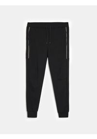 Sinsay - Spodnie dresowe jogger - czarny. Kolor: czarny. Materiał: dresówka