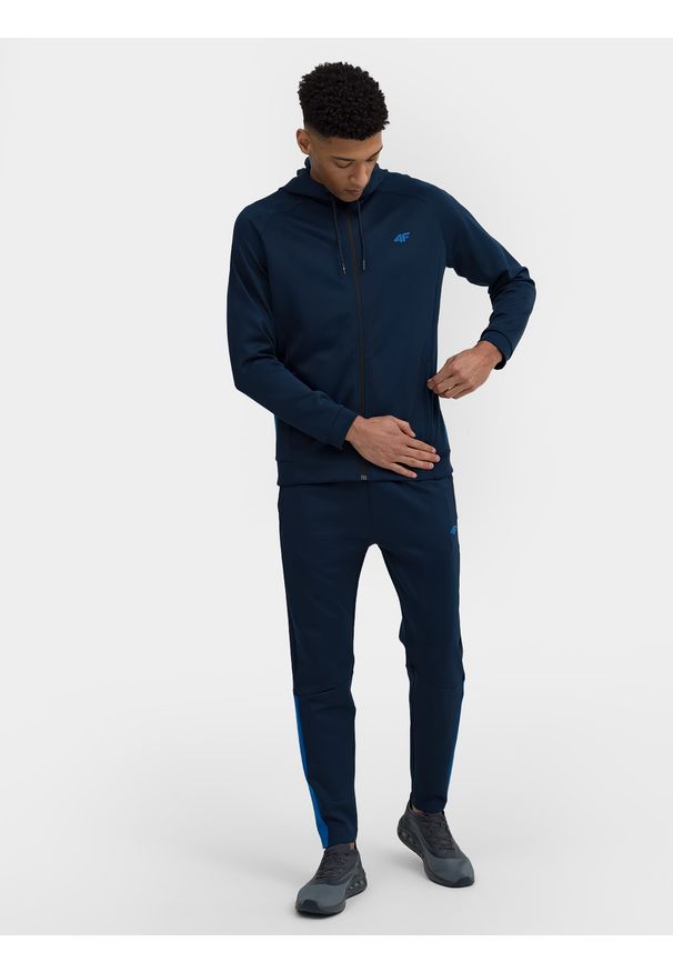 4f - Spodnie treningowe szybkoschnące męskie. Kolor: niebieski. Materiał: włókno, dzianina, materiał