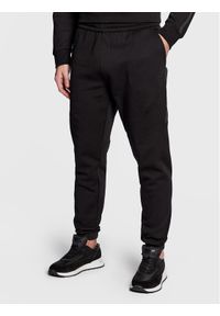 Calvin Klein Spodnie dresowe K10K110820 Czarny Regular Fit. Kolor: czarny. Materiał: bawełna, dresówka, syntetyk